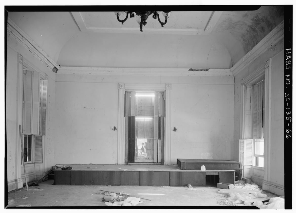 Photograph: The east wall and the stage, seen from the middle of the hall